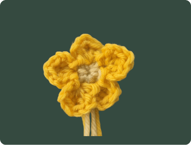 Haak een kleine bloem van restjes garen